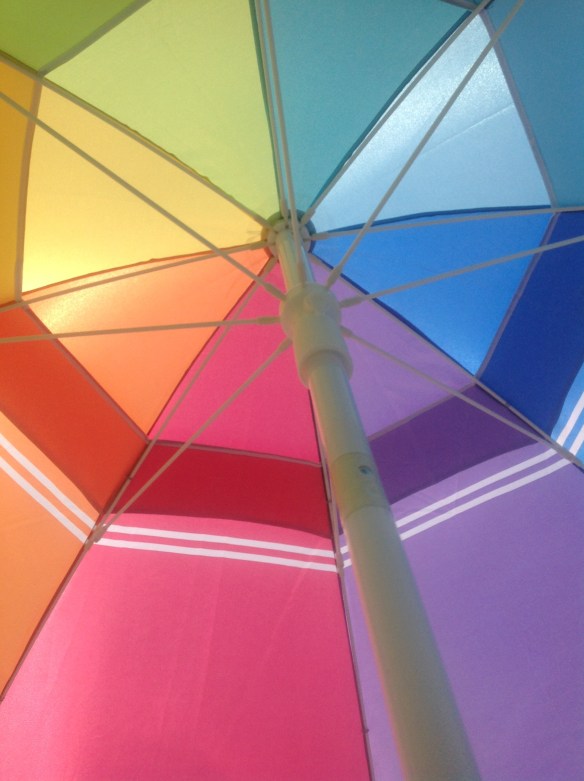 Cooling it with hubby under the umbrella.  Summer 2014